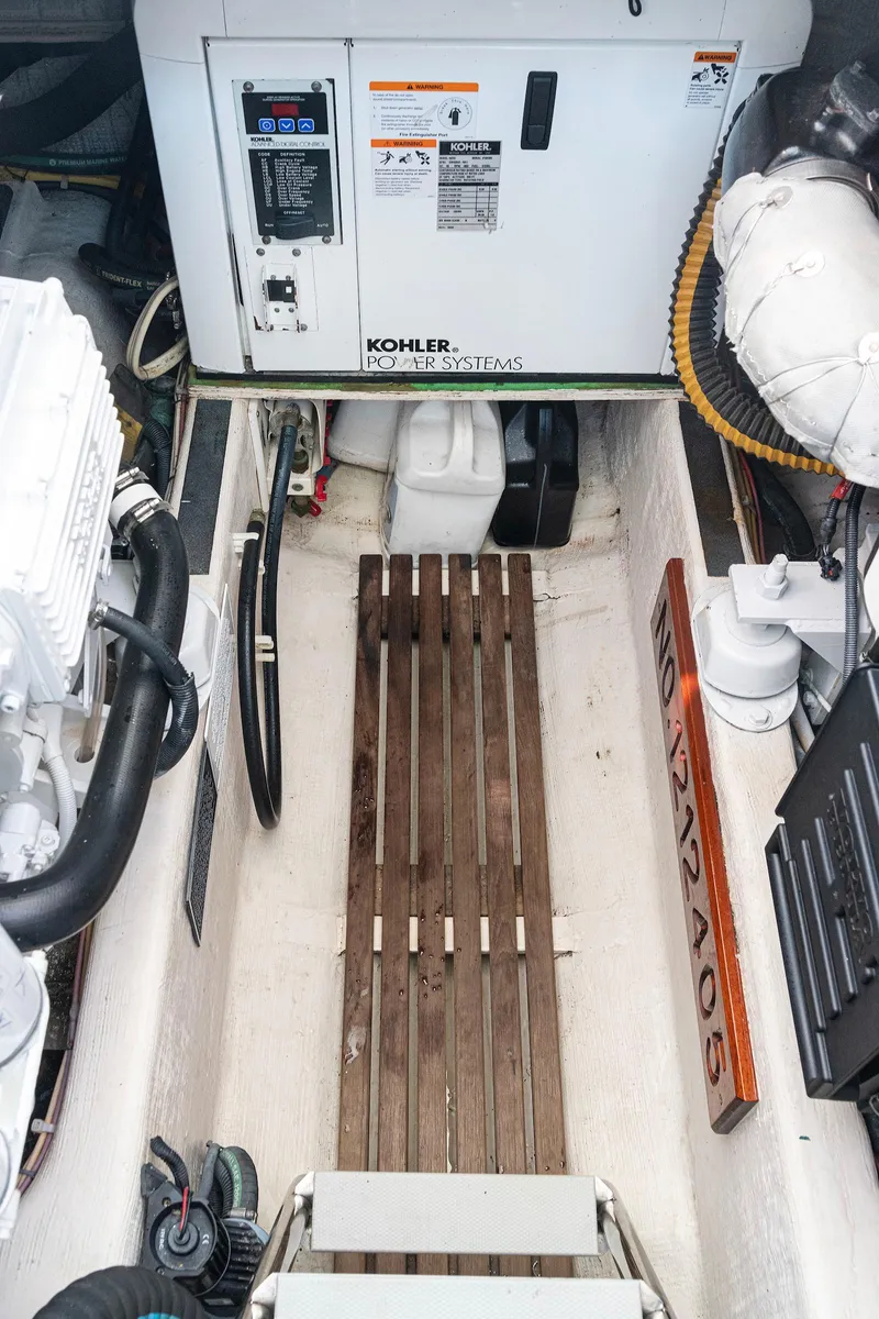 Slide: The Image of Engine room of 2008 Sabre 34 Express with Kohler power system. - 24