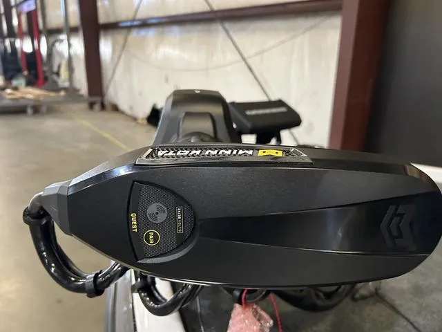 Slide: The Image of Close-up of 2025 Skeeter ZXR20 W/Yamaha 250 boat control panel in a warehouse. - 12