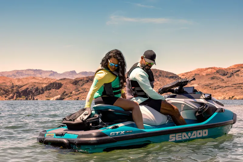 Slide: The Image of 2025 Sea-Doo GTX Limited 325 with Sound on scenic lake adventure. - 8