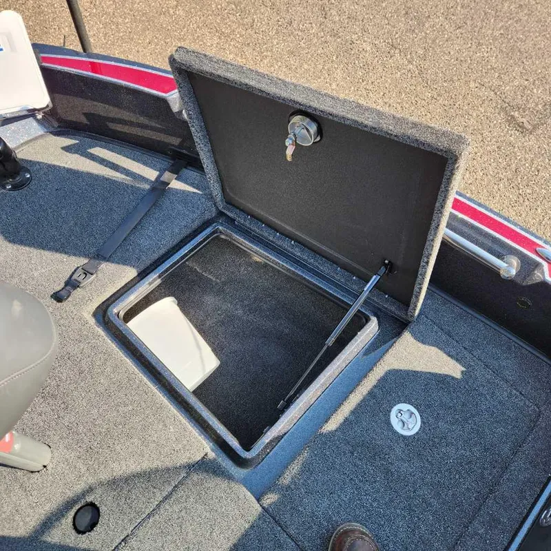 Slide: The Image of 2024 Nitro ZV20 Pro boat storage compartment with open hatch. - 15