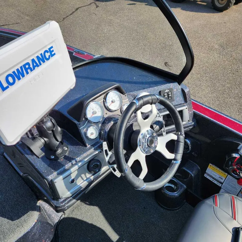 Slide: The Image of 2024 Nitro ZV20 Pro boat dashboard with Lowrance navigation system and modern steering wheel. - 6