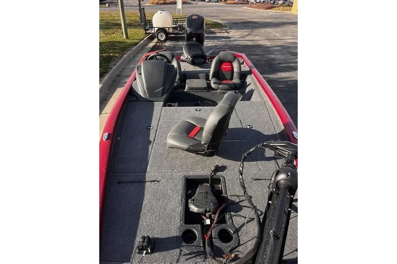 Slide: The Image of 2025 Tracker Pro Team 195 Tournament Edition boat with seating and equipment on deck. - 80