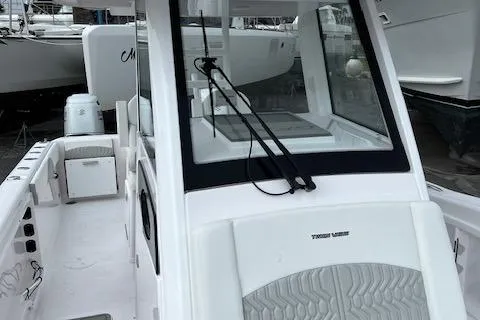 Slide: The Image of 2025 Twin Vee 280 GFX2 CC boat interior with modern design and spacious layout. - 22