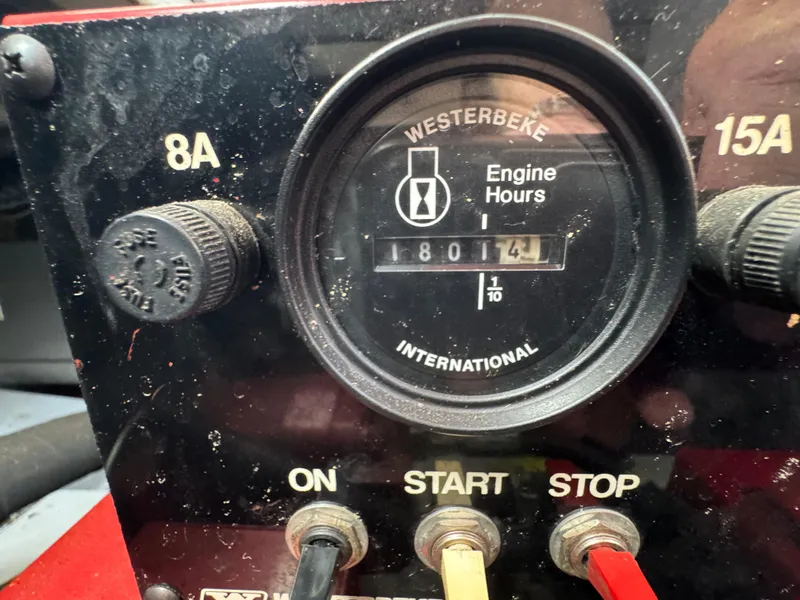 Slide: The Image of Control panel of a 1999 Sumerset 16 X 80 with Westerbeke engine hour meter. - 13
