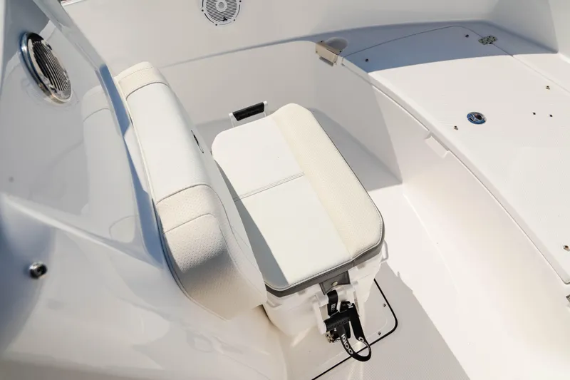 Slide: The Image of 2025 Edgewater 188CC boat interior with cushioned seating and storage area. - 21