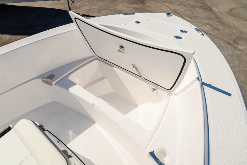 Slide: The Image of 2025 Edgewater 188CC boat with open storage compartment on deck. - 29