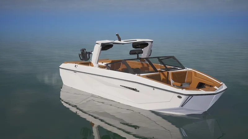 Slide: The Image of 2025 Nautique Super Air Nautique G25 boat on calm water, showcasing sleek design. - 1