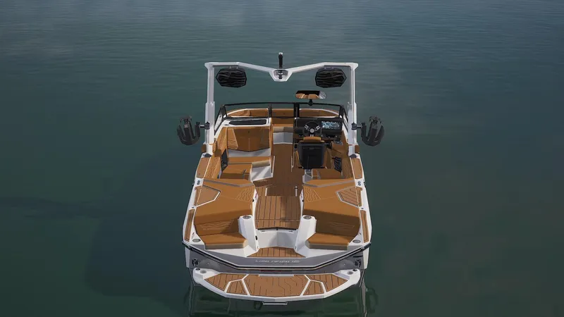 Slide: The Image of 2025 Nautique Super Air Nautique G25 boat on calm water, top view. - 3