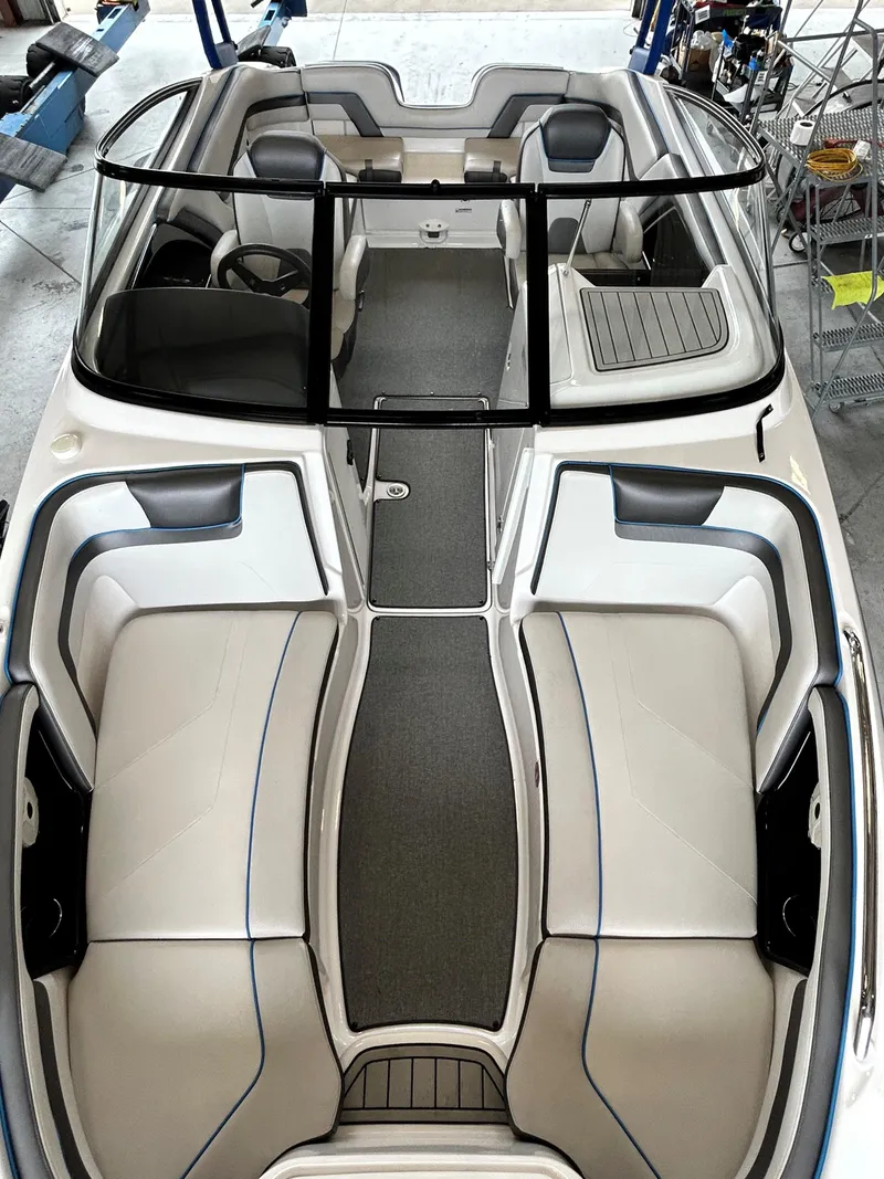 Slide: The Image of 2020 Yamaha AR 240 boat interior with spacious seating and sleek design. - 12