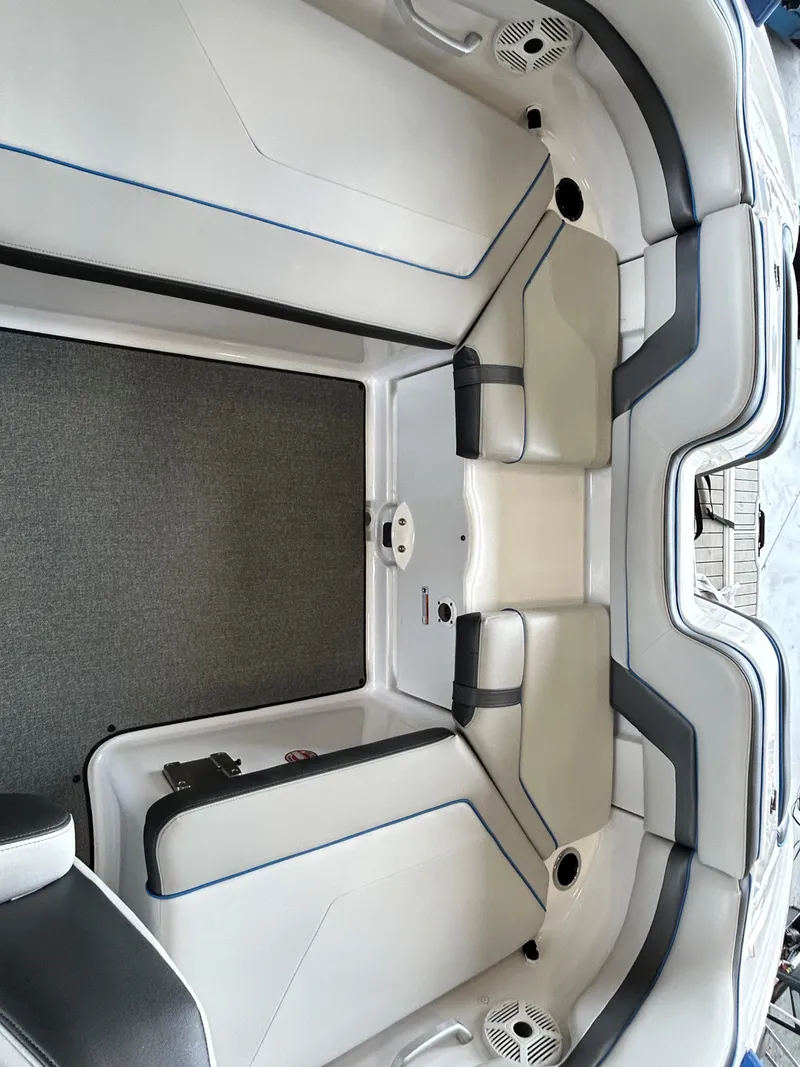 Slide: The Image of 2020 Yamaha AR 240 boat interior with sleek seating and modern design. - 9