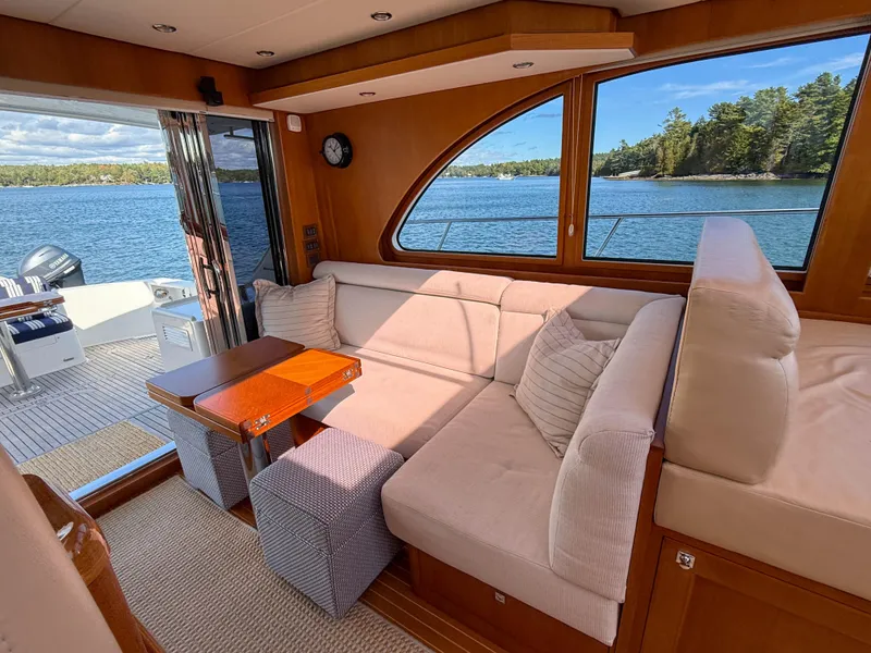 Slide: The Image of Luxurious 2014 Grand Banks 50 Eastbay SX yacht interior with scenic water view. - 14