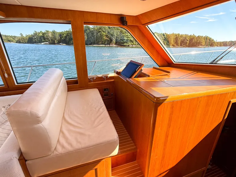 Slide: The Image of Interior of 2014 Grand Banks 50 Eastbay SX yacht with scenic water view. - 15