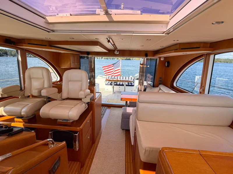 Slide: The Image of Luxurious interior of 2014 Grand Banks 50 Eastbay SX yacht with scenic water view. - 33