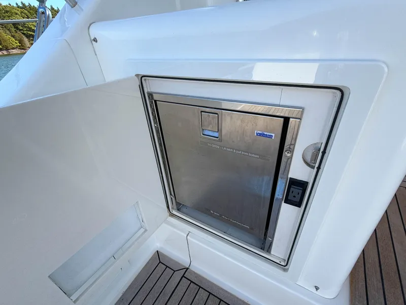 Slide: The Image of Built-in refrigerator on 2014 Grand Banks 50 Eastbay SX yacht deck. - 39