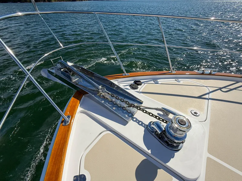 Slide: The Image of 2014 Grand Banks 50 Eastbay SX yacht bow with anchor and winch system. - 44