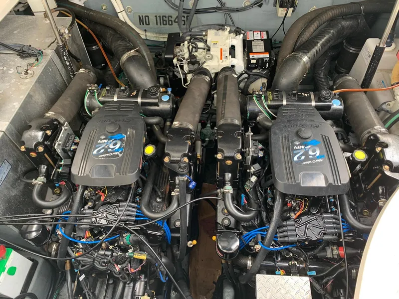 Slide: The Image of Engine compartment of 2004 Sea Ray 320 Sundancer with twin MerCruiser 6.2L MPI engines. - 18