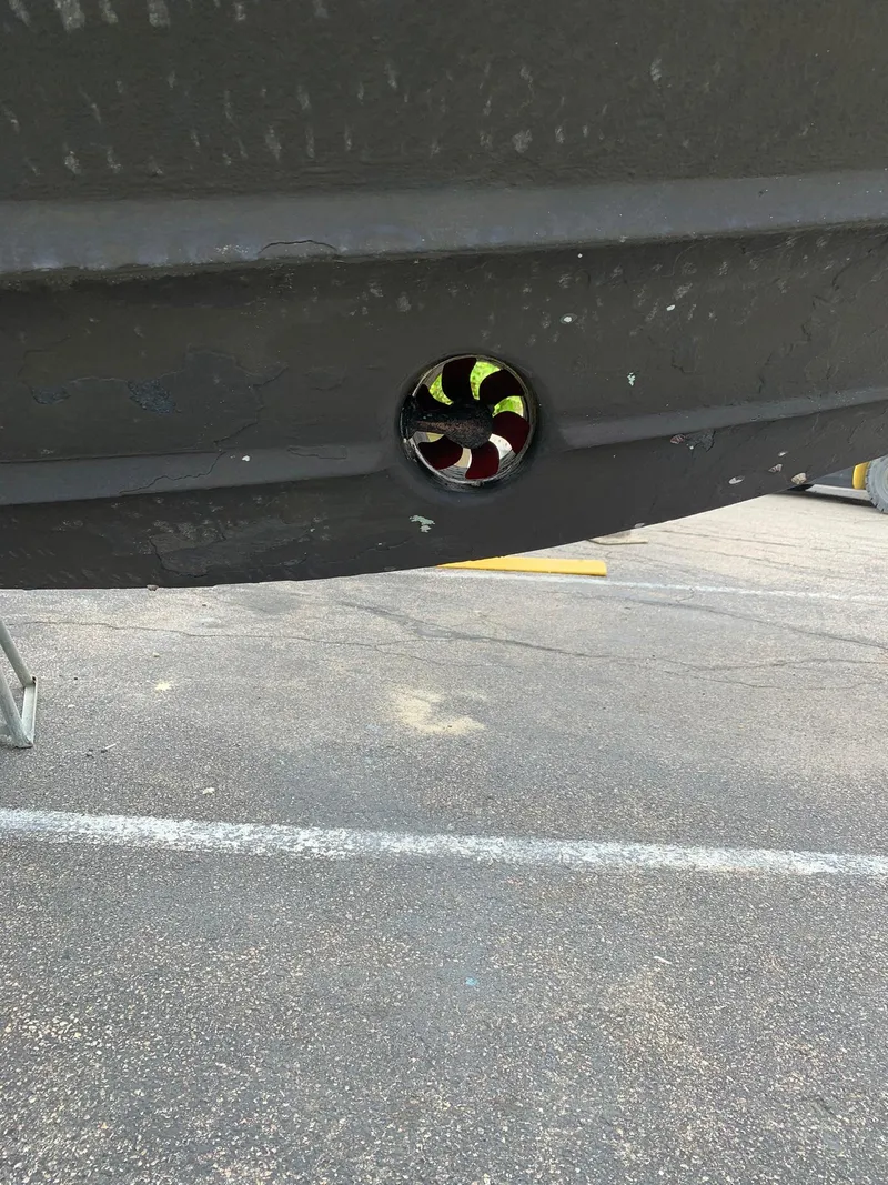 Slide: The Image of Close-up of a 2004 Sea Ray 320 Sundancer hull with a bow thruster. - 21