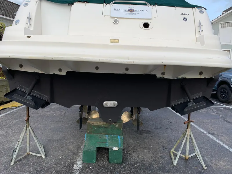 Slide: The Image of 2004 Sea Ray 320 Sundancer boat on stands at Hyannis Marina. - 3