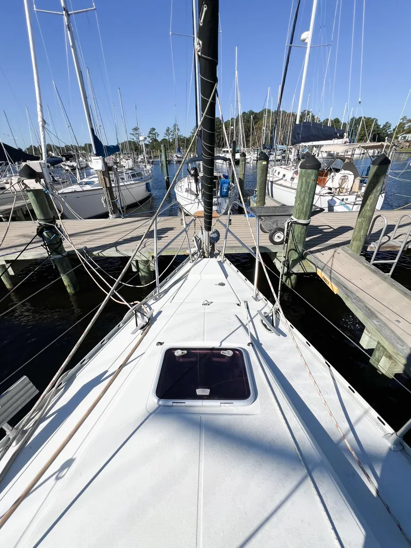 Slide: The Image of Deck view of 1989 Jeanneau Voyage 11.20 in harbor. - 3