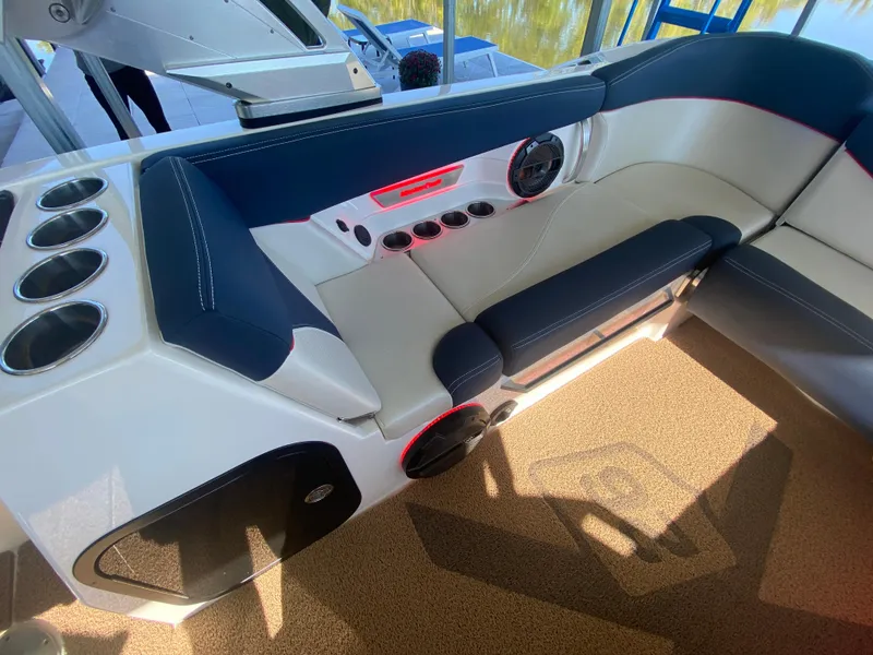 Slide: The Image of 2018 MasterCraft X26 boat interior with sleek seating and modern design. - 20