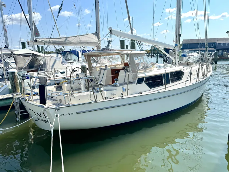 The Image of 1999 Bowman 48 Aft Cockpit sailboat docked in marina. - 0