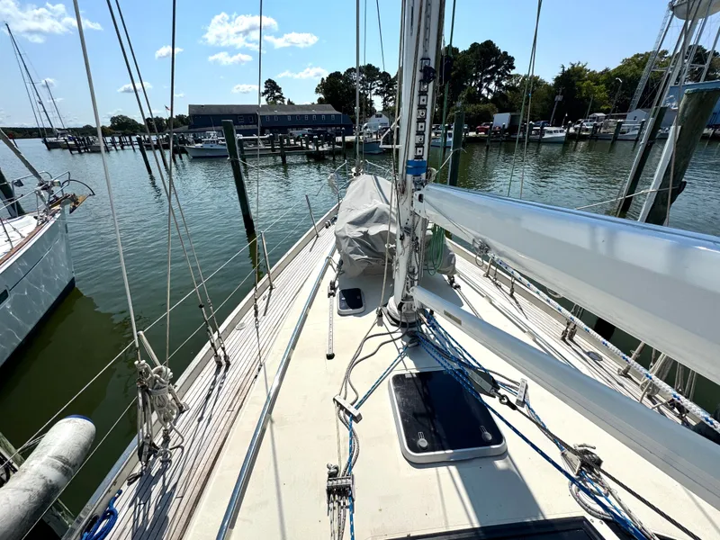 Slide: The Image of Deck of a 1999 Bowman 48 Aft Cockpit sailboat in harbor. - 21