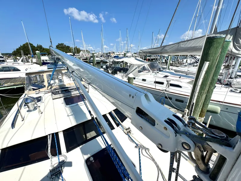 Slide: The Image of Bowman 48 Aft Cockpit 1999 sailboat in marina. - 24