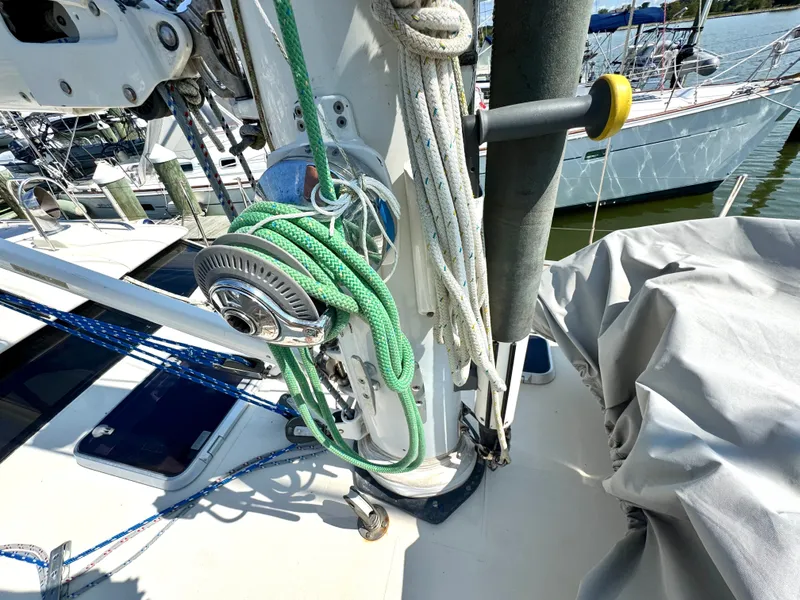 Slide: The Image of Close-up of 1999 Bowman 48 Aft Cockpit sailboat with ropes and winches. - 26