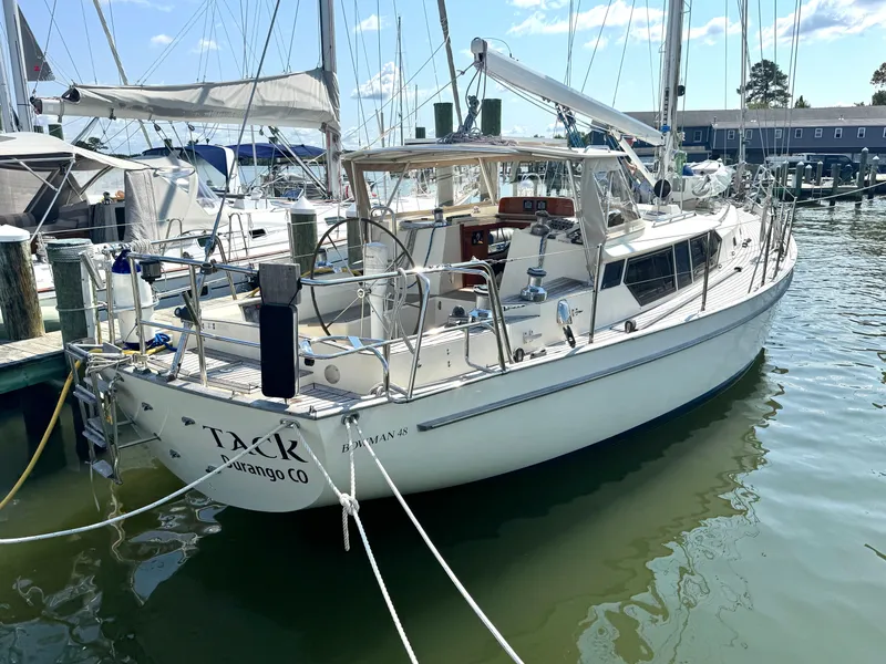 Slide: The Image of 1999 Bowman 48 Aft Cockpit sailboat docked in marina. - 3
