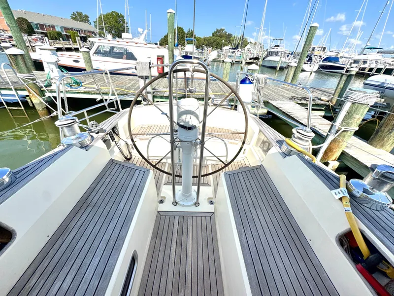 Slide: The Image of 1999 Bowman 48 Aft Cockpit yacht docked in marina. - 37