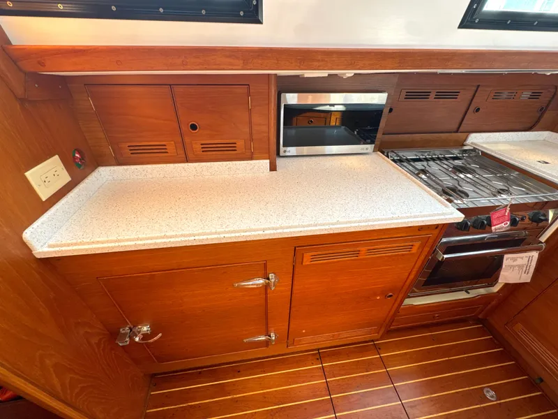 Slide: The Image of Galley area of a 1999 Bowman 48 Aft Cockpit yacht. - 48