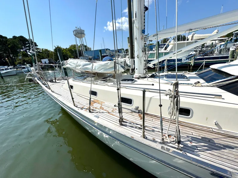 Slide: The Image of 1999 Bowman 48 Aft Cockpit sailboat docked in marina. - 5