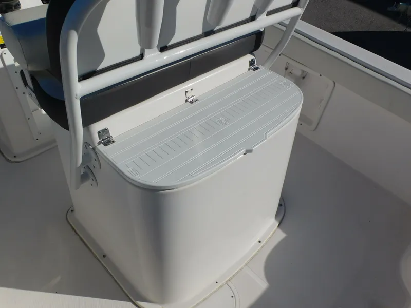 Slide: The Image of 2023 Clearwater 2200 WI Center Console boat seating and storage area. - 22