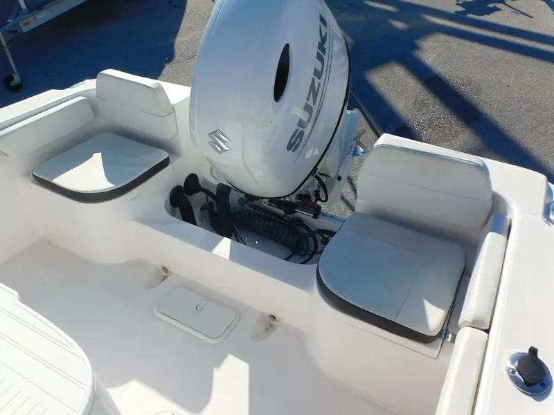 Slide: The Image of 2023 Clearwater 2200 WI Center Console boat with Suzuki outboard motor. - 24