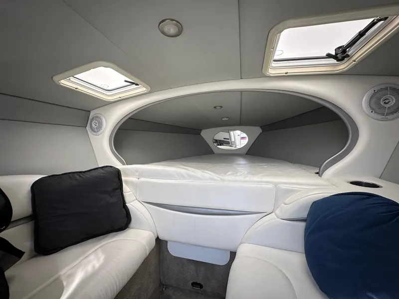 Slide: The Image of Interior cabin of 2004 Formula 292 FASTech boat with skylights and cushions. - 2