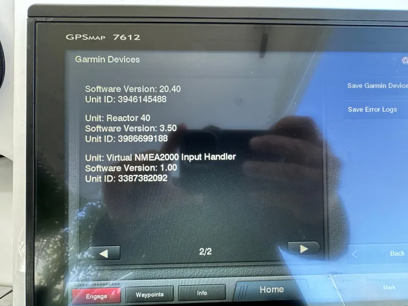 Slide: The Image of Garmin GPSMAP 7612 display on 2005 Intrepid 348 WA boat, showing software versions and unit IDs. - 6