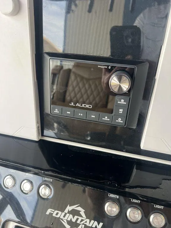 Slide: The Image of JL Audio system on 2018 Fountain 38CC LS boat dashboard. - 15
