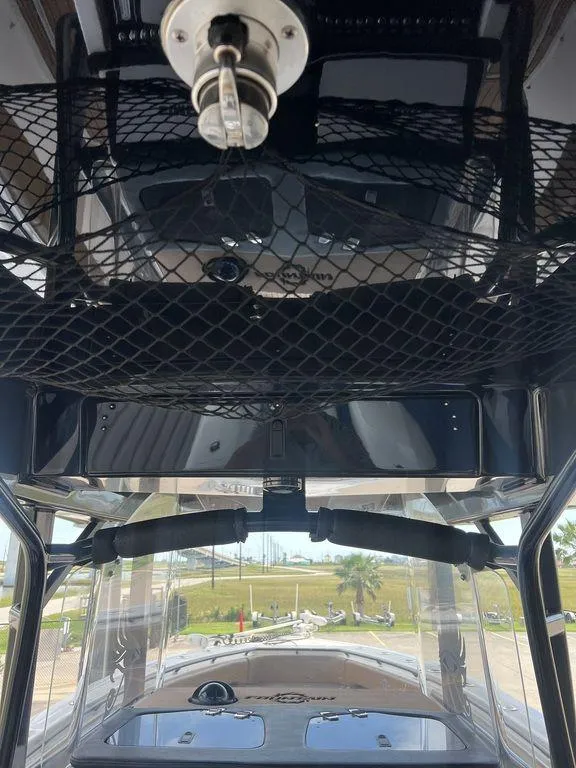 Slide: The Image of Interior view of 2018 Fountain 38CC LS boat with overhead storage net. - 21