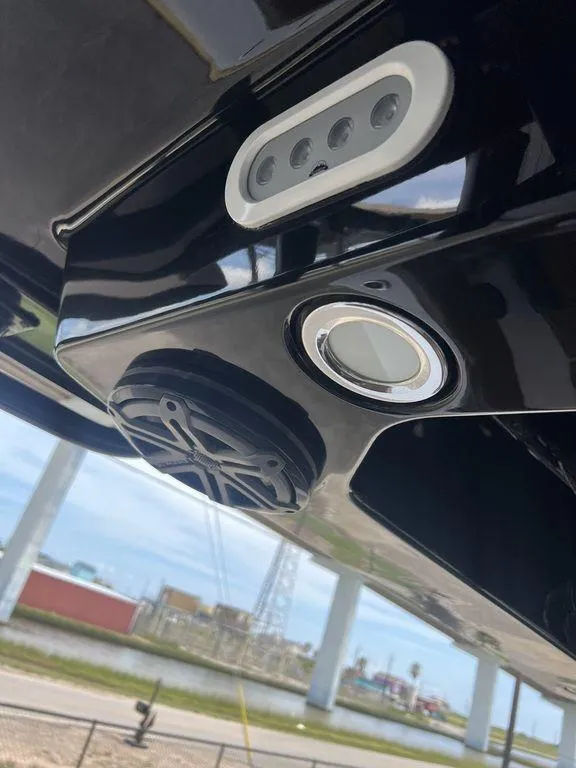 Slide: The Image of Close-up of 2018 Fountain 38CC LS boat's underwater lights and speaker system. - 23