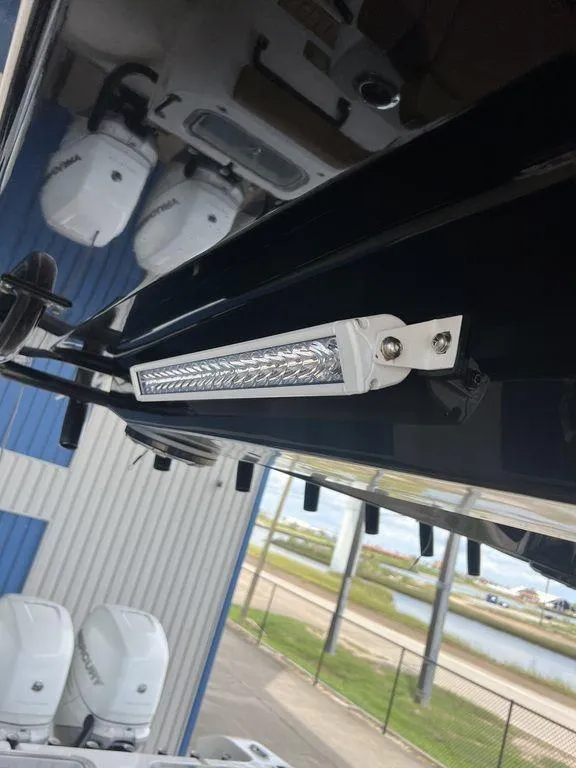 Slide: The Image of 2018 Fountain 38CC LS boat detail with LED light and engines. - 28