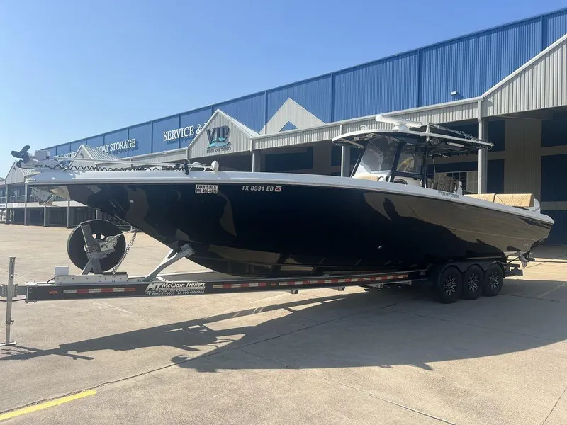 Slide: The Image of 2018 Fountain 38CC LS boat on trailer outside storage facility. - 3