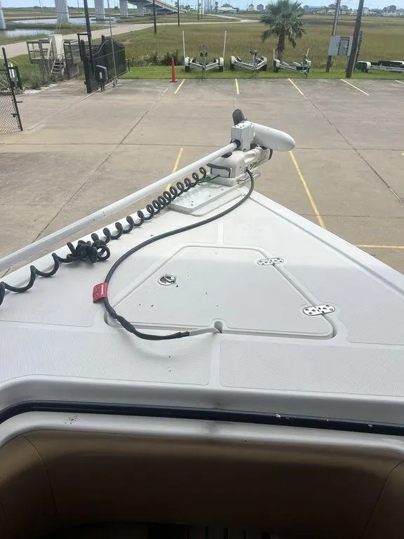 Slide: The Image of 2018 Fountain 38CC LS boat bow with trolling motor in parking lot. - 49