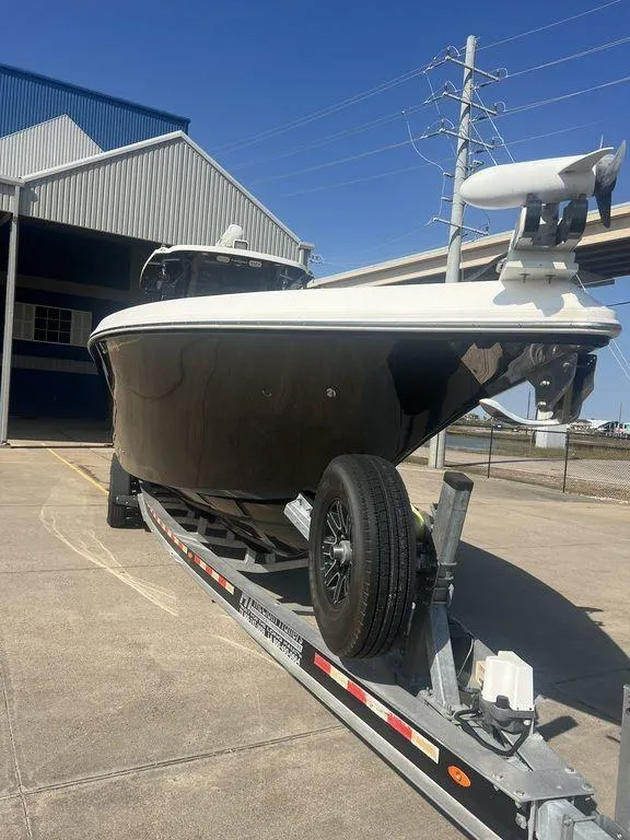 Slide: The Image of 2018 Fountain 38CC LS boat on trailer, parked outdoors. - 5