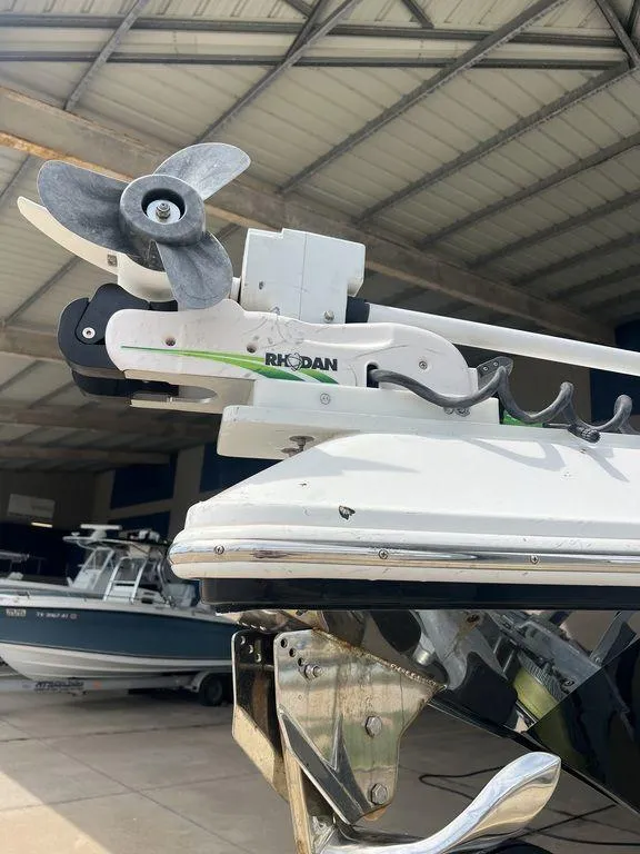 Slide: The Image of 2018 Fountain 38CC LS boat with Rhodan trolling motor in a marina. - 7