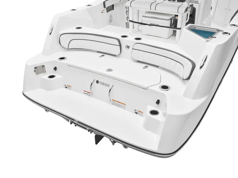 Slide: The Image of 2025 Yamaha Boats 222FSH SPORT, sleek white deck with seating and storage. - 28