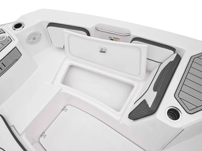 Slide: The Image of 2025 Yamaha Boats 222FSH SPORT interior storage compartment, sleek design, white and gray accents. - 32
