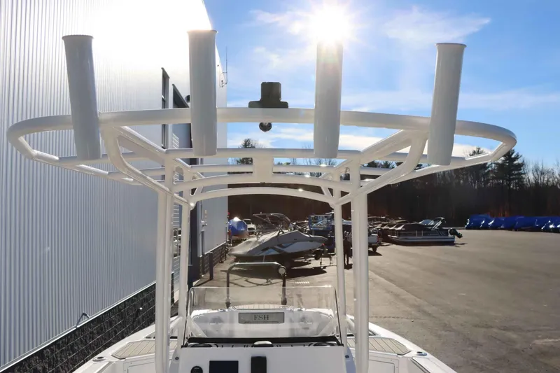 Slide: The Image of 2025 Yamaha Boats 222 FSH Sport with T-top under bright sun. - 9