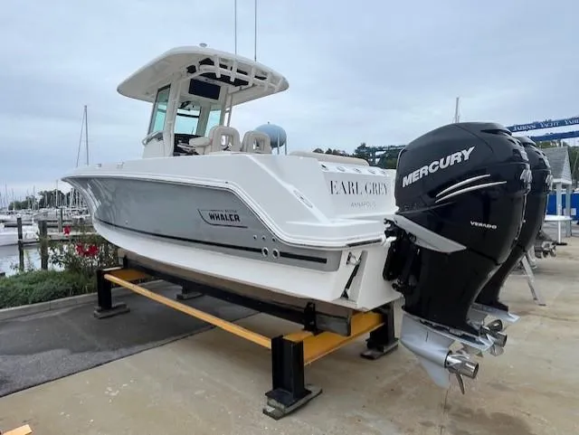 Slide: The Image of 2020 Boston Whaler 280 Outrage boat with Mercury engine on display. - 4