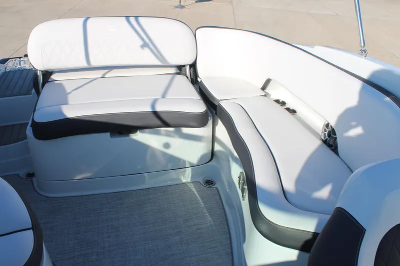 Slide: The Image of 2024 Crownline Eclipse E255 boat interior storage compartment. - 17