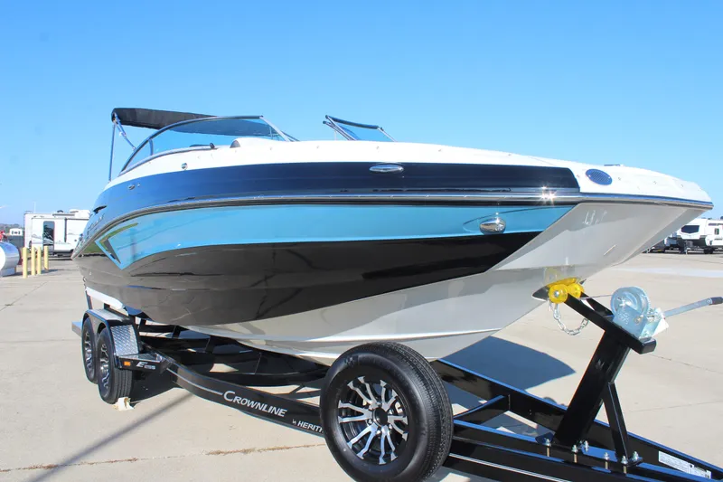 Slide: The Image of 2024 Crownline Eclipse E255 boat bathroom with granite countertop and stainless steel sink. - 25